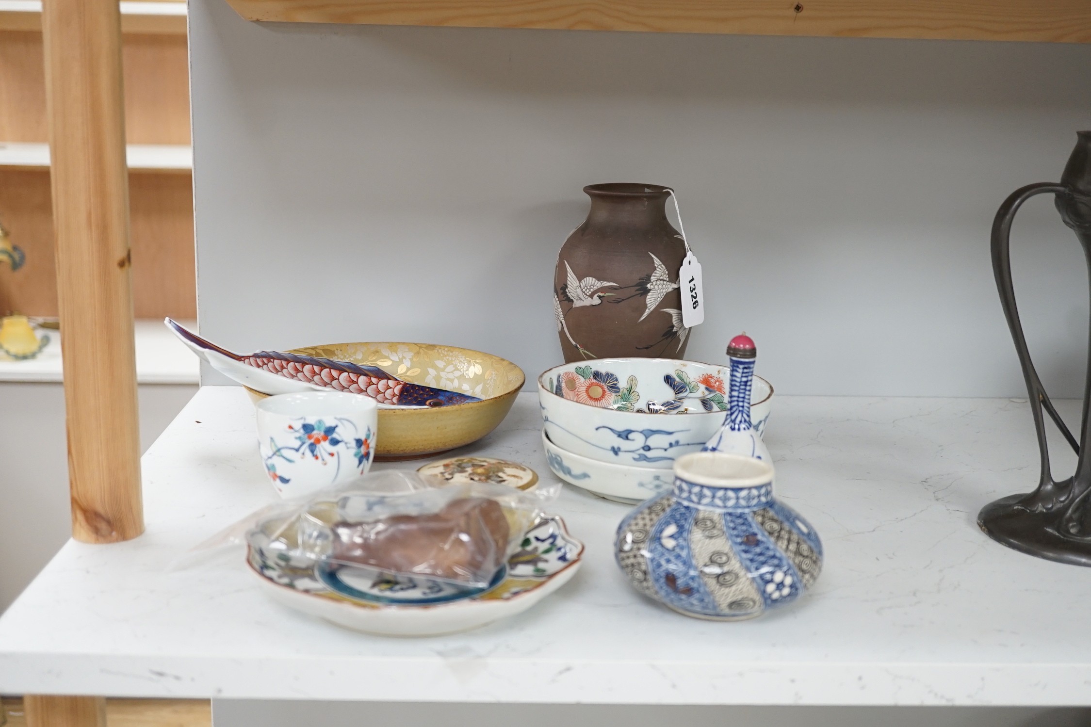 A group of 19th/20th century Japanese ceramics, Including five dishes, three vases, a cup, a Satsuma box and cover and a model of a dog